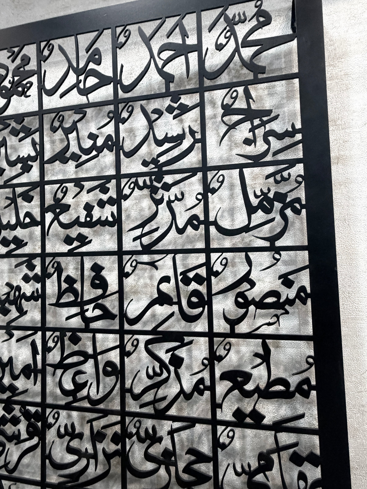 99 Names of Prophet Muhammad metal wall art, angled wall view